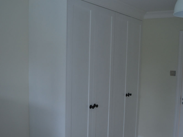 Fitted white wardrobes